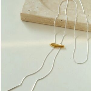 Elegant Gold and Sterling Silver Necklace